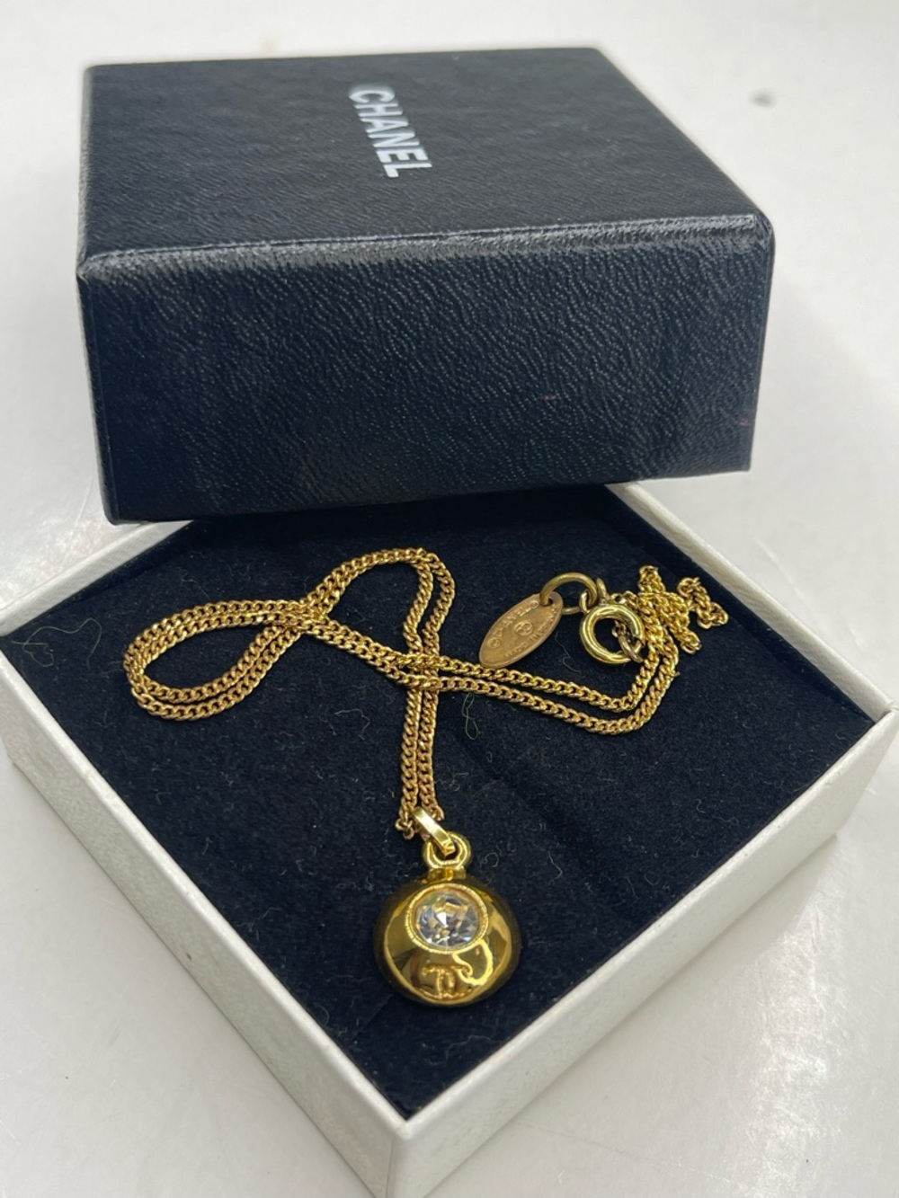 CHANEL Gold-Tone Crystal Disc Pendant Necklace - Picture 8 of 9